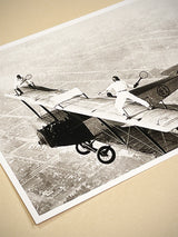 black-and-white-postcard-with-tennis-players-on-a-plane