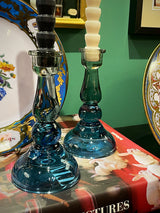 blue-glass-candleholders-with-candles
