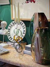 interior-decoration-with-glass-candlesticks-and-vases