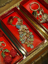 Llavero con Cristales ‘Lucky Charm’ - Pavo Real