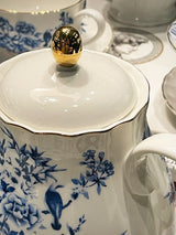 tetera-de-porcelana-con-flores-y-pajaros