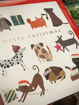 Tarjeta de Navidad 'Festive Dogs' - Caroline Gardner