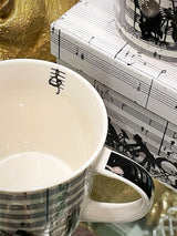  Analyzing image    taza-de-porcelana-medida-mug-partituras-musicales